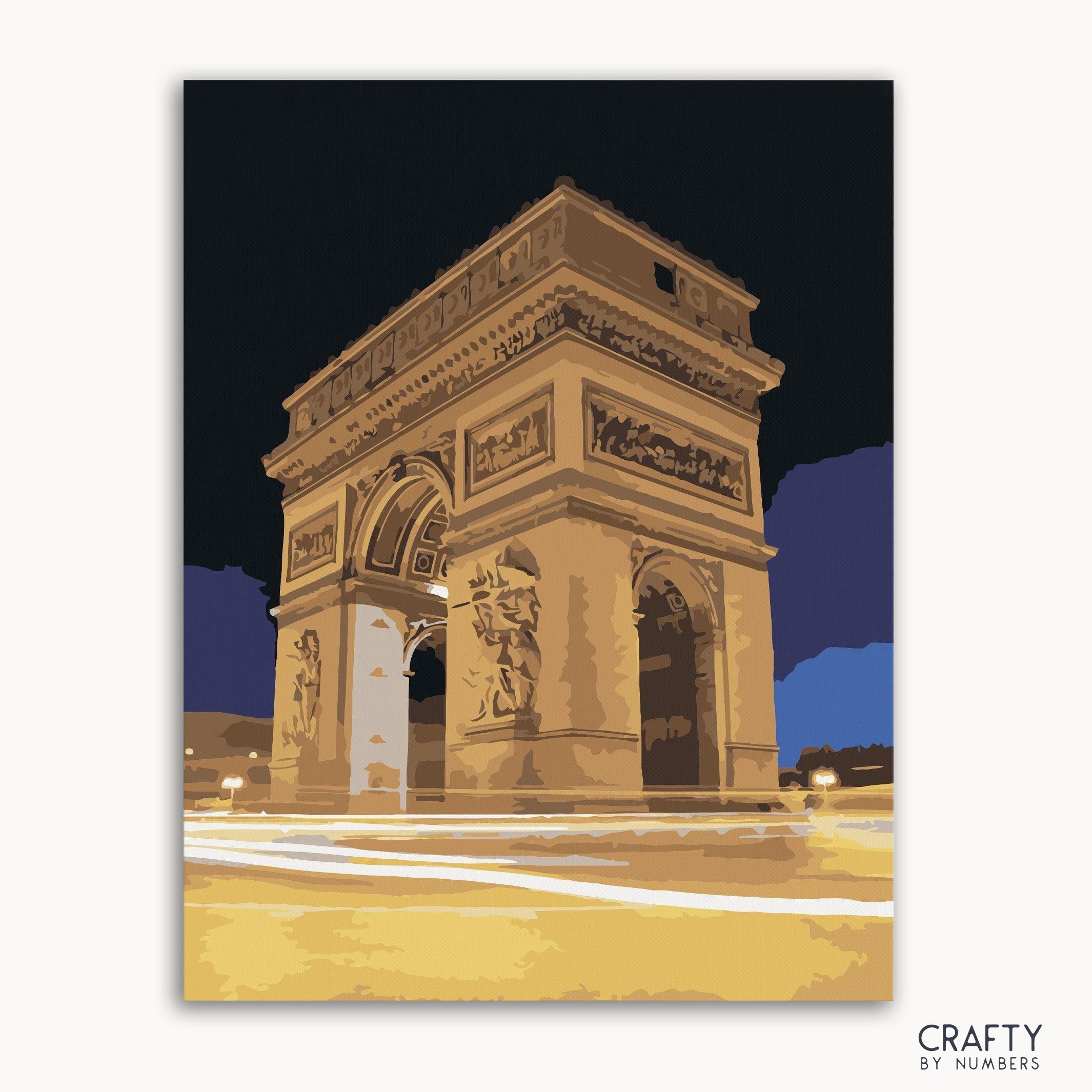 A paint by numbers kit featuring a night view of the Arc de Triomphe, with the option to frame or not frame the canvas.