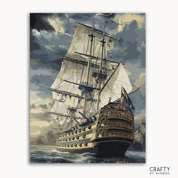 A paint-by-numbers kit image featuring a boat on the ocean with waves and a cloudy sky in the background.collection