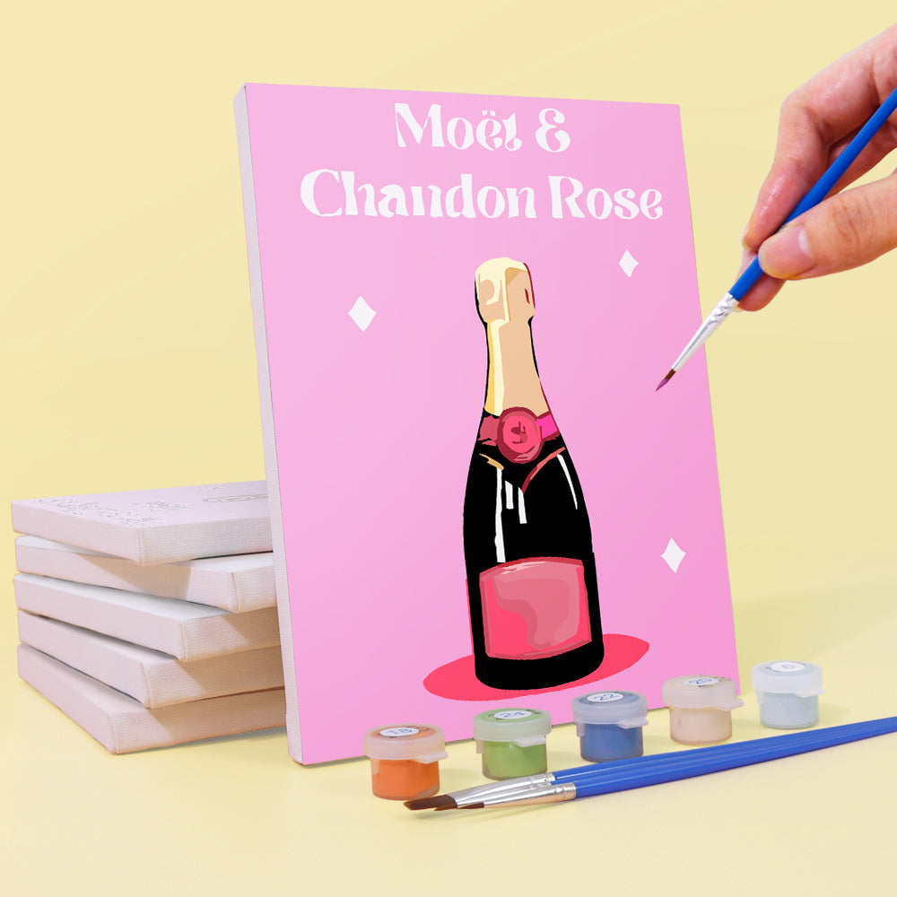 artist painting Close-up of Rosé Champagne paint by numbers canvas with detailed numbered sections for easy painting