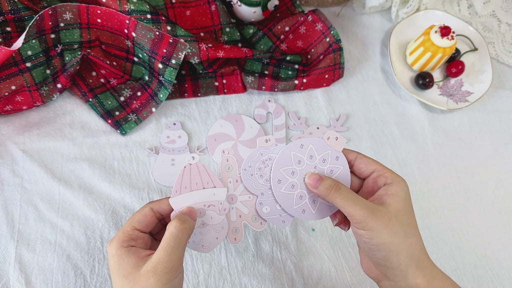 Winter-inspired Christmas decorations in the form of snowflakes, arranged in a festive display.