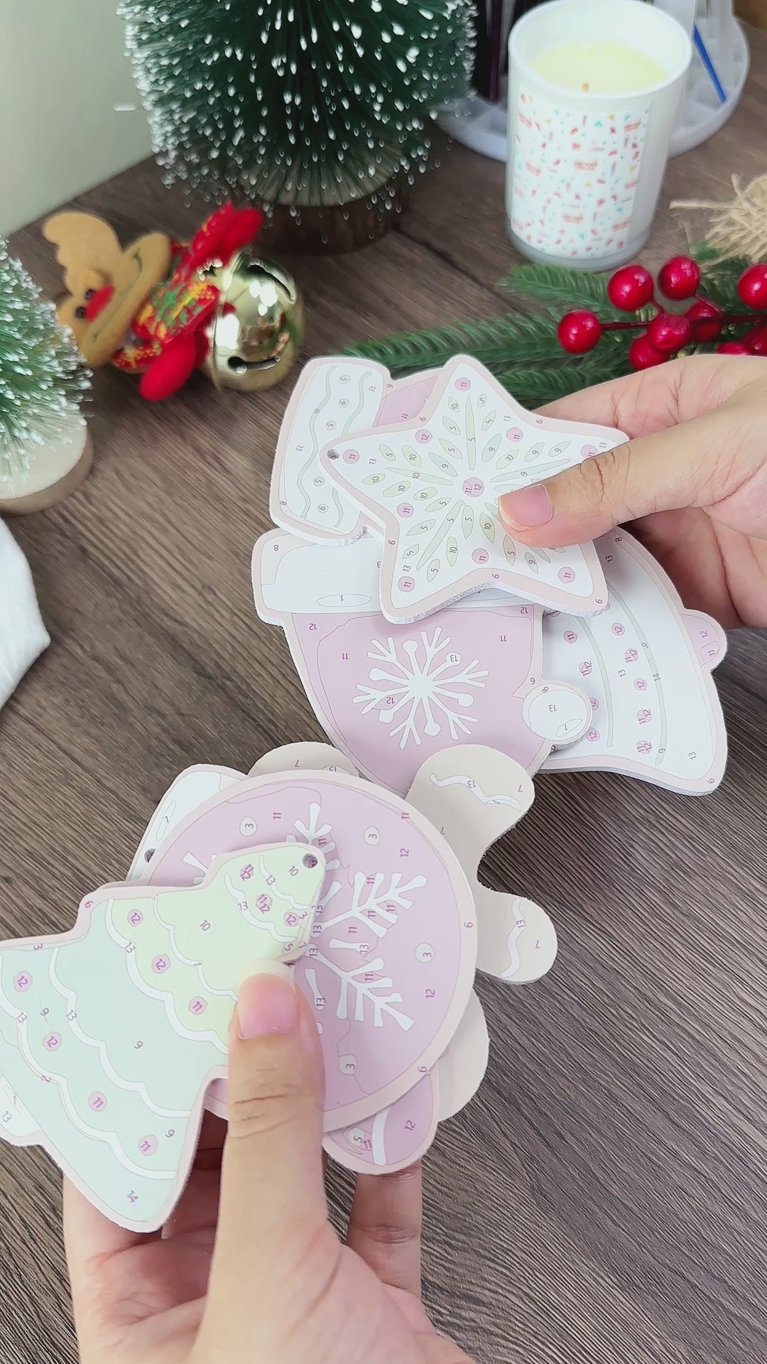 Festive Christmas tree decorations featuring shimmering spheres and glitter accents.
