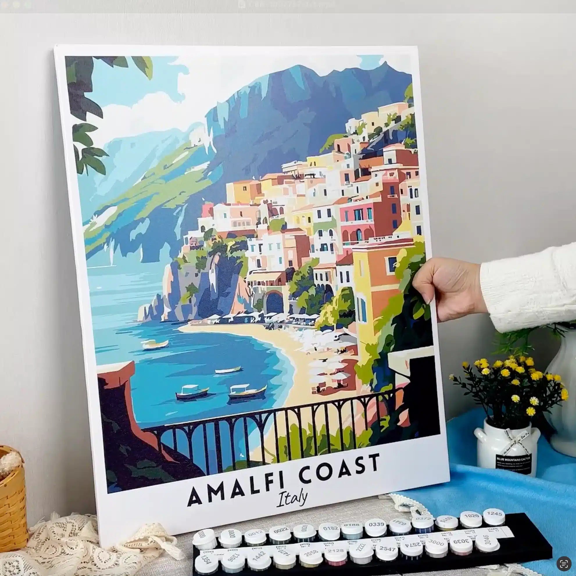 Display the final paint by numbers design of Amalfi Coast travel poster from Crafty by Numbers