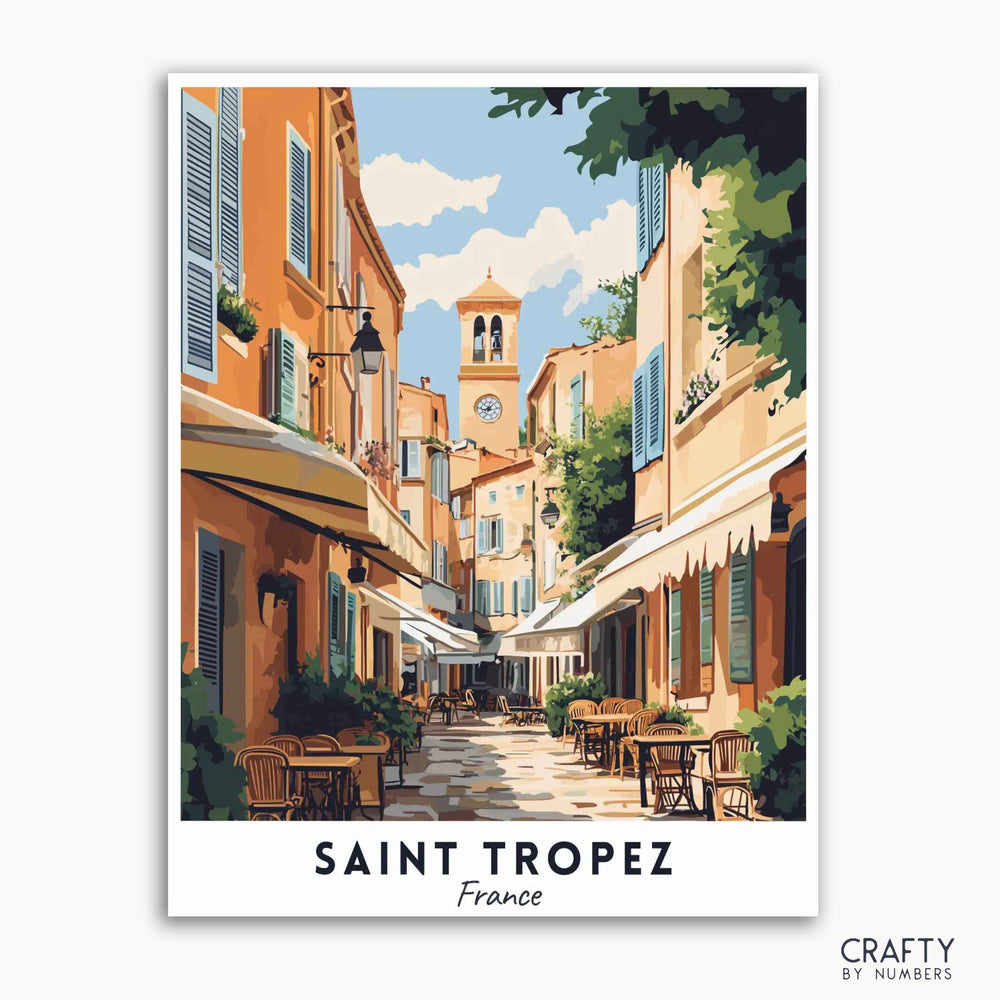 A travel poster depicting the quaint streets and architecture of Saint Tropez, France, with a clock tower in the background.