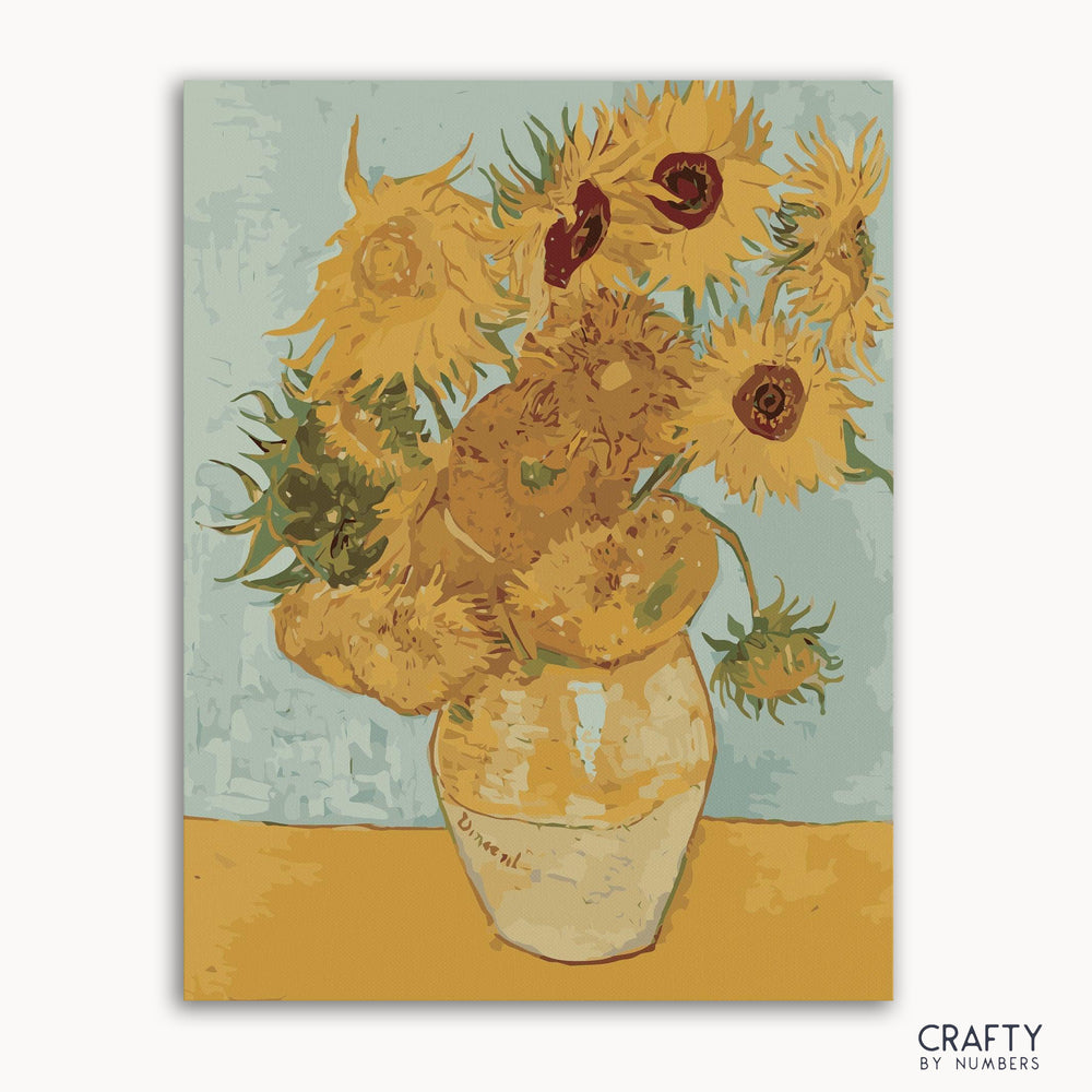 A paint-by-numbers kit with a image of a vase containing sunflowers, after Vincent Van Gogh's artwork.