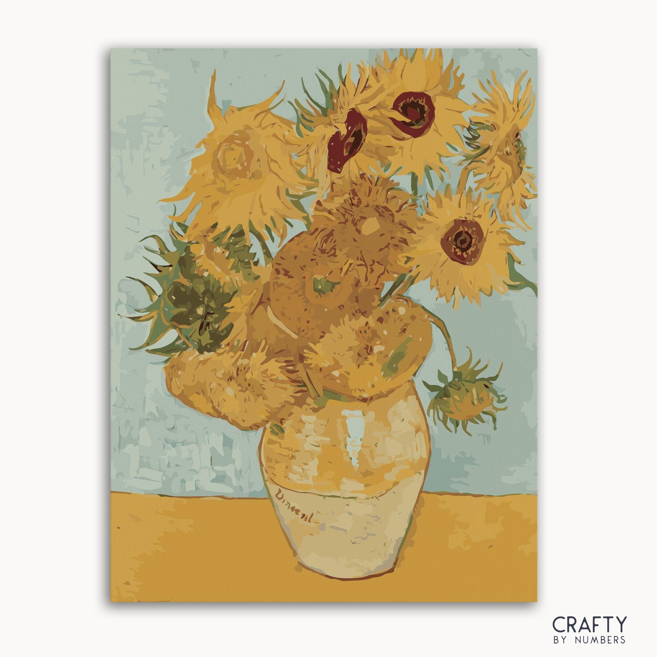 A paint-by-numbers kit with a image of a vase containing sunflowers, after Vincent Van Gogh's artwork.