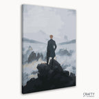 Close-up of paint-by-numbers canvas with foggy mountain and figure outline