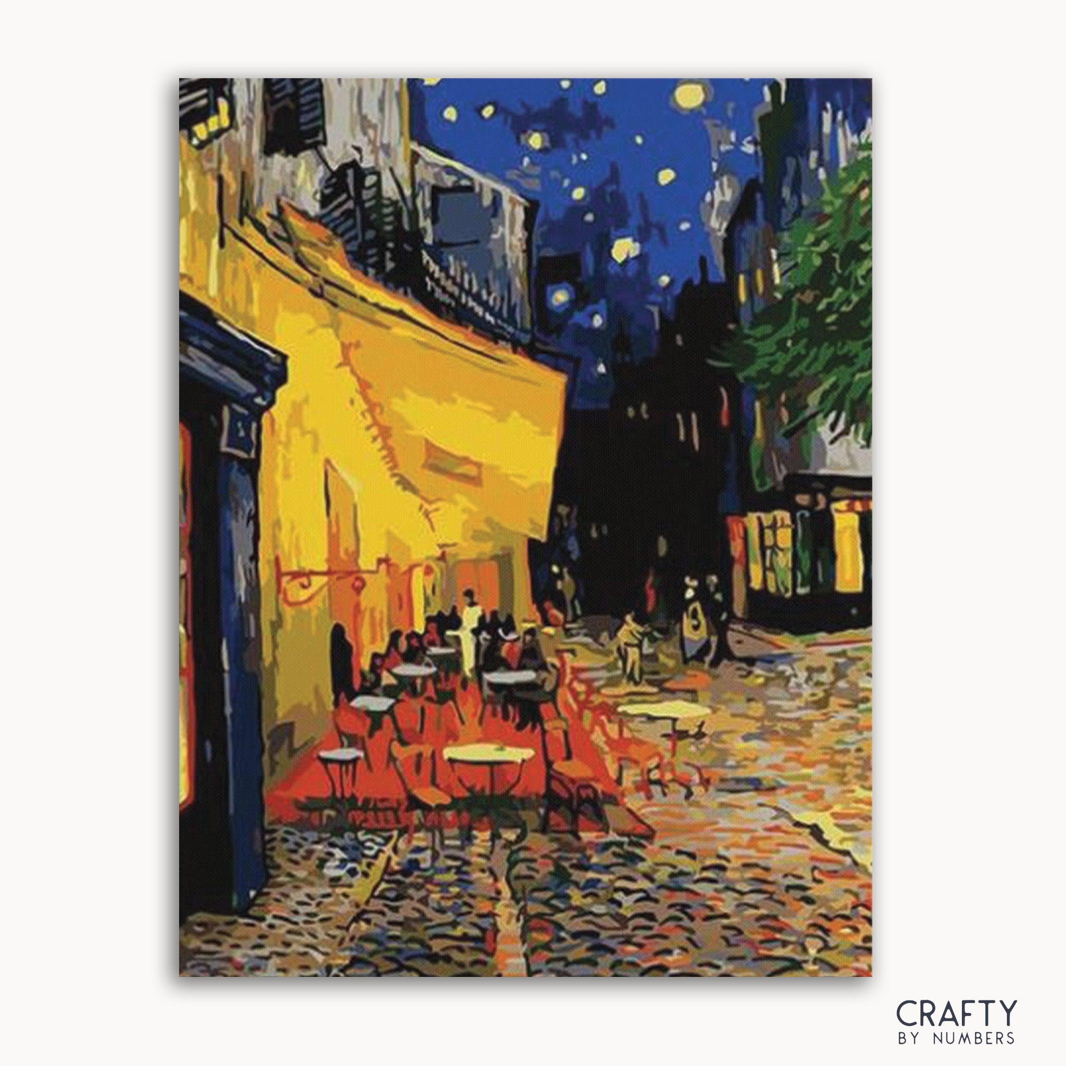A paint-by-numbers kit featuring 'The Café Terrace' by Vincent Van Gogh, with numbered areas indicating where to apply paint.