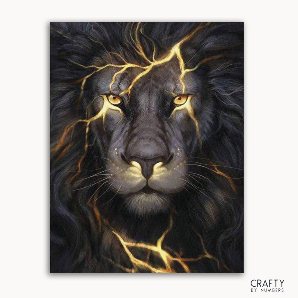 A paint by numbers kit featuring a black lion with gold accents on a puzzle-like board.