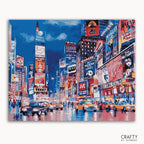 A paint-by-numbers kit depicting a vibrant Times Square scene with several buildings and advertisements.