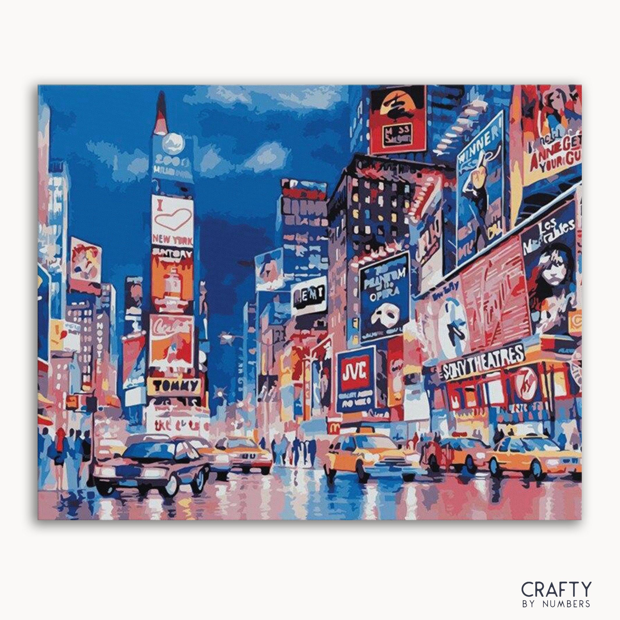 A paint-by-numbers kit depicting a vibrant Times Square scene with several buildings and advertisements.