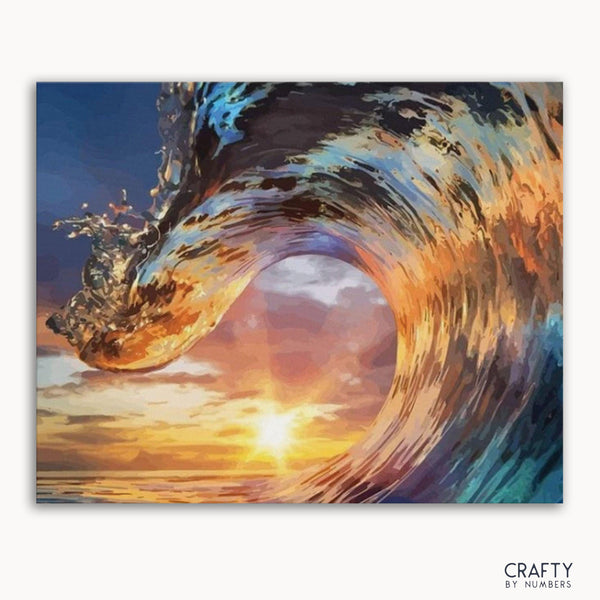 A paint-by-numbers kit image featuring a artistic representation of waves and a sunset.