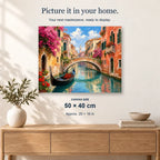 Venetian Canal Bloom displayed on a sunlit wall above an oak cabinet. Canvas size 50 × 40 cm.