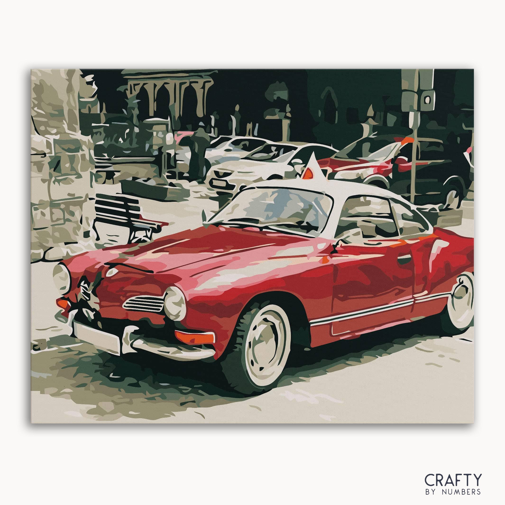 A paint by numbers kit featuring a vintage red car on a street background.