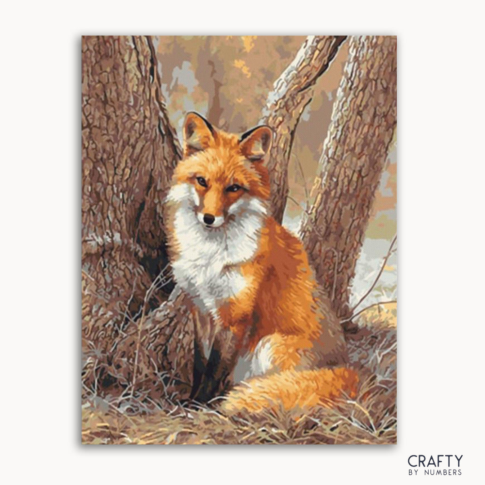 A paint-by-numbers kit image featuring a artistic representation of a red fox sitting near trees.