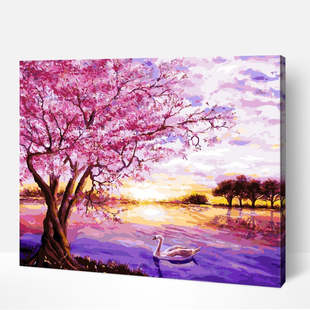 Paintbrush applying soft pink paint on Pink Blossoms paint by numbers floral petals