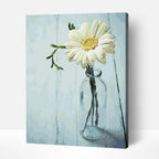 DIY flower canvas kit for beginners featuring a single bloom artwork.