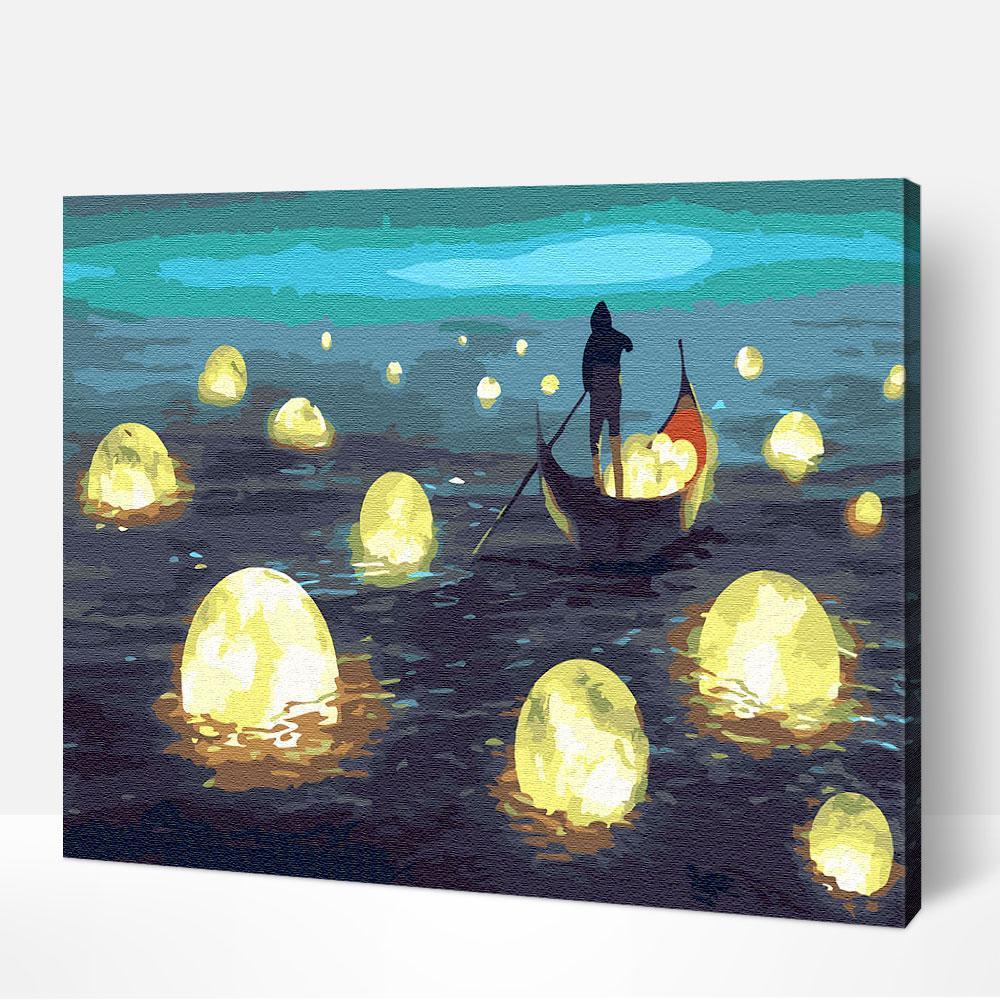 DIY paint by numbers canvas of a Moon Catcher with glowing moonlight